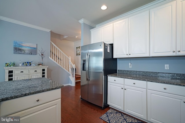35427 Mercury Dr Unit 47B, Rehoboth Beach, DE 19971 - kitchen featuring stainless steel fridge with ice dispenser, crown molding, dark wood-style floors, white cabinetry, and dark stone counters