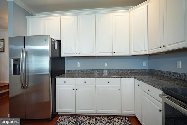 35427 Mercury Dr Unit 47B, Rehoboth Beach, DE 19971 - kitchen with stainless steel appliances, white cabinets, dark wood-type flooring, ornamental molding, and dark stone counters