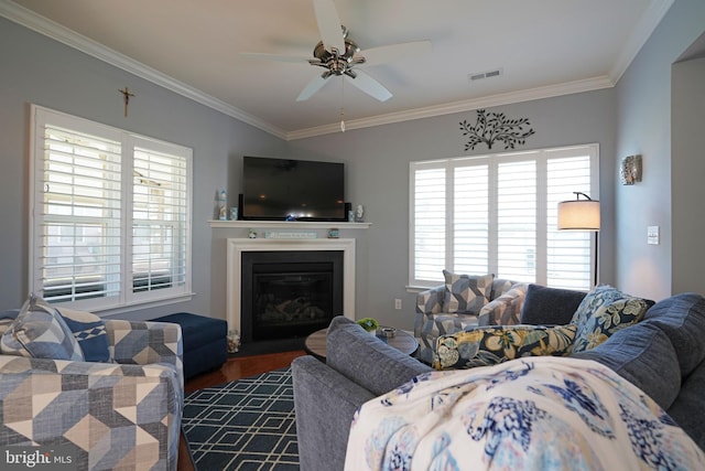 35427 Mercury Dr Unit 47B, Rehoboth Beach, DE 19971 - living area with ceiling fan, crown molding, dark wood-style flooring, and a glass covered fireplace