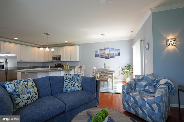 35427 Mercury Dr Unit 47B, Rehoboth Beach, DE 19971 - living area featuring dark wood-type flooring, ornamental molding, recessed lighting, and baseboards