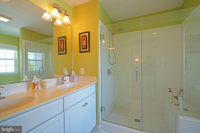 35427 Mercury Dr Unit 47B, Rehoboth Beach, DE 19971 - full bathroom with a stall shower and double vanity