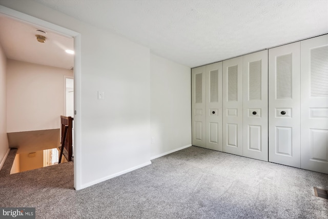 1279 Elm Grove Cir, Silver Spring, MD 20905 - unfurnished bedroom featuring carpet floors, a closet, and baseboards