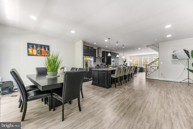 2660 Richmond Way, Hanover, MD 21076 - dining area featuring light wood-type flooring, recessed lighting, and stairway