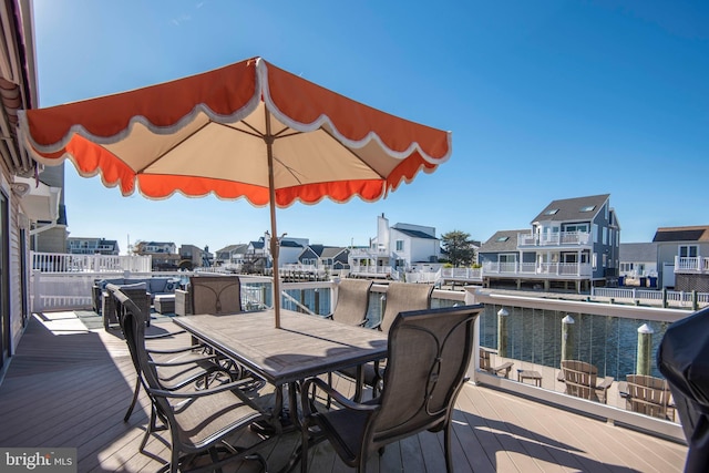 28 Diane Rd, Manahawkin, NJ 08050 - wooden terrace with outdoor dining space and a water view