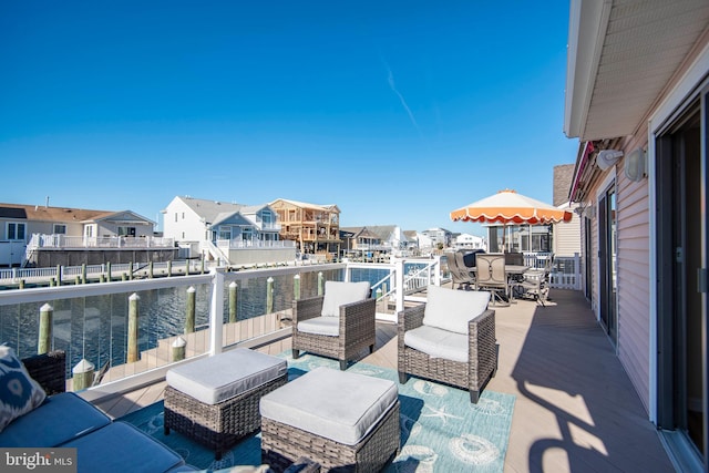 28 Diane Rd, Manahawkin, NJ 08050 - view of patio with a residential view and a water view
