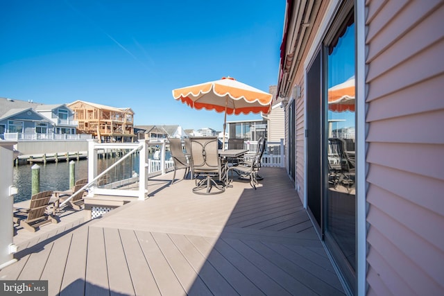 28 Diane Rd, Manahawkin, NJ 08050 - wooden deck featuring a water view and a residential view