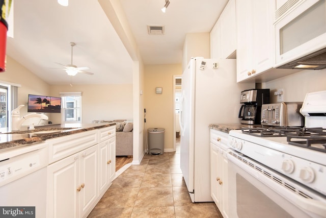 28 Diane Rd, Manahawkin, NJ 08050 - kitchen with white appliances, a ceiling fan, dark stone counters, and white cabinetry