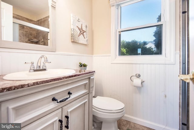 28 Diane Rd, Manahawkin, NJ 08050 - bathroom with wainscoting, toilet, healthy amount of natural light, a stall shower, and vanity