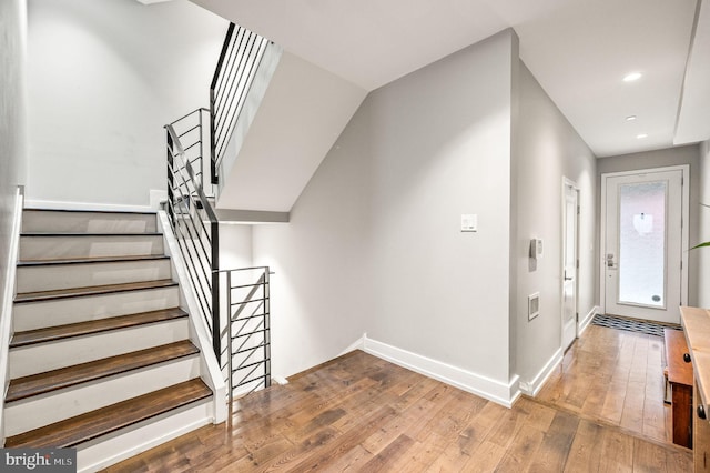307 Reed St Unit C, Philadelphia, PA 19147 - staircase featuring hardwood / wood-style floors, baseboards, and recessed lighting