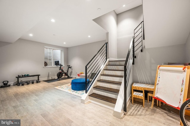 307 Reed St Unit C, Philadelphia, PA 19147 - stairs with baseboards, wood finished floors, and recessed lighting