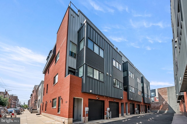 307 Reed St Unit C, Philadelphia, PA 19147 - view of property featuring an attached garage
