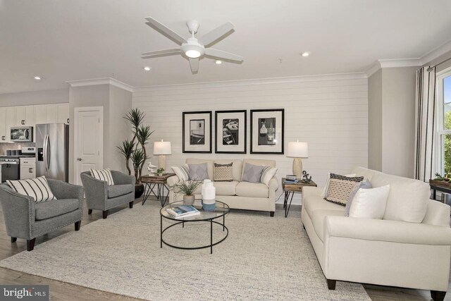 527 Seaway Ln, Cambridge, MD 21613 - living area with ornamental molding, light wood finished floors, recessed lighting, and a ceiling fan