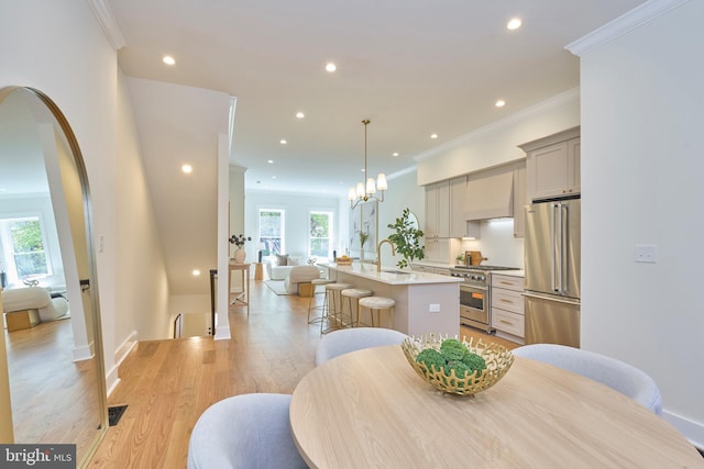 309 M St NW Unit B, Washington, DC 20001 - dining room featuring healthy amount of natural light, ornamental molding, recessed lighting, light wood-style flooring, and a chandelier