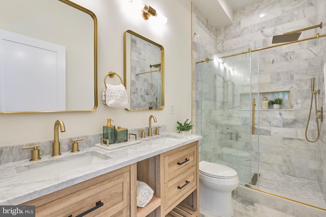 309 M St NW Unit B, Washington, DC 20001 - bathroom featuring a stall shower, toilet, and double vanity