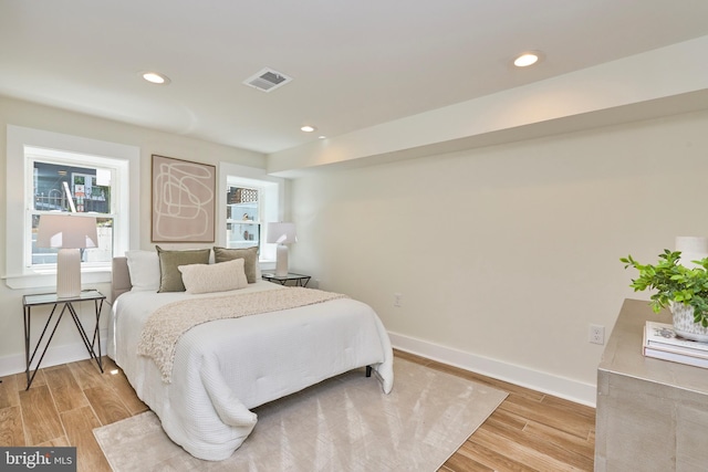 309 M St NW Unit B, Washington, DC 20001 - bedroom with light wood-type flooring, baseboards, and recessed lighting