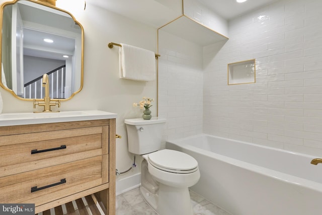 309 M St NW Unit B, Washington, DC 20001 - bathroom with toilet, marble finish flooring, vanity, baseboards, and recessed lighting