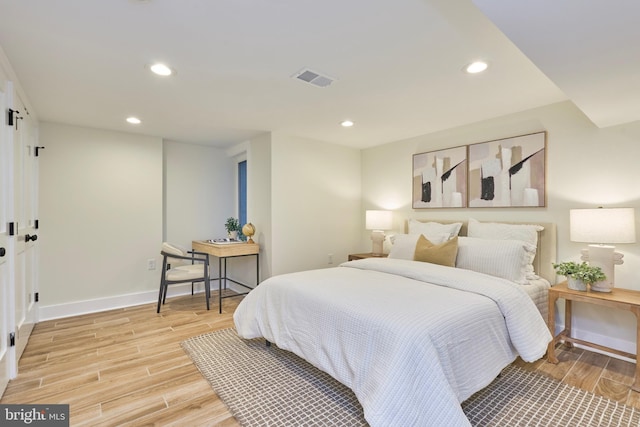 309 M St NW Unit B, Washington, DC 20001 - bedroom with light wood-style floors, recessed lighting, and baseboards