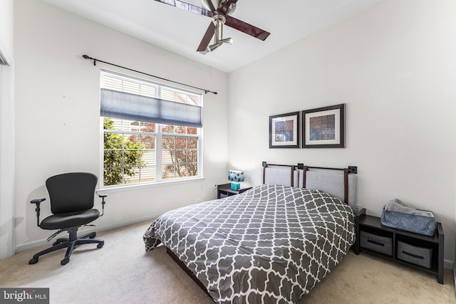 bedroom with carpet floors, baseboards, and ceiling fan