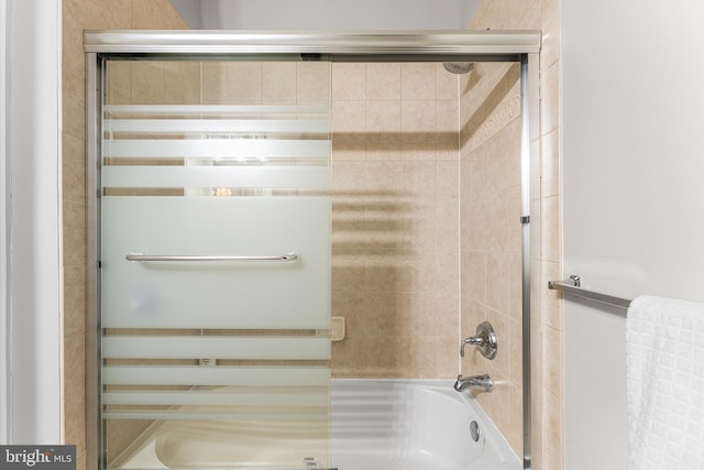 full bath with bath / shower combo with glass door