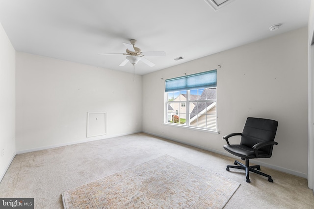 unfurnished room with carpet, baseboards, and a ceiling fan