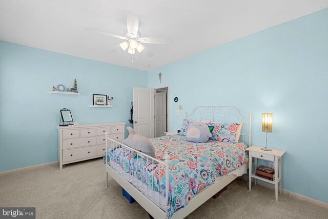 23325 April Mist Pl, Brambleton, VA 20148 - bedroom featuring light colored carpet, a ceiling fan, and baseboards
