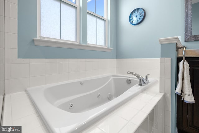 23325 April Mist Pl, Brambleton, VA 20148 - bathroom featuring a jetted tub and vanity