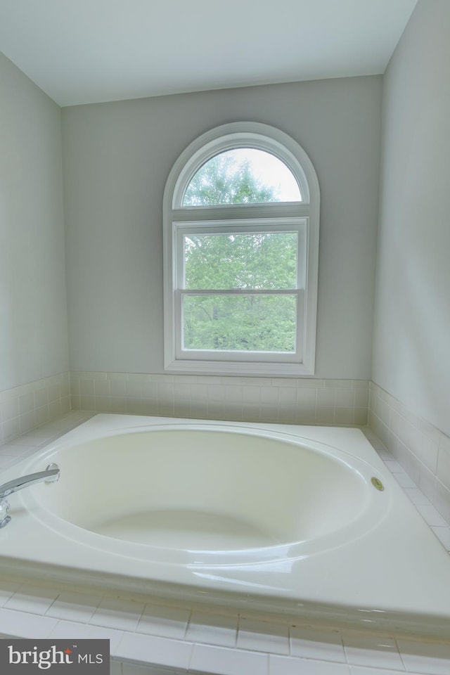 bathroom featuring a garden tub