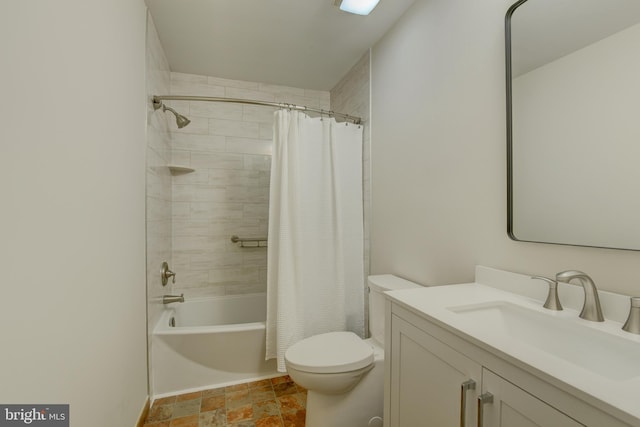 full bathroom featuring toilet, vanity, and shower / bath combo