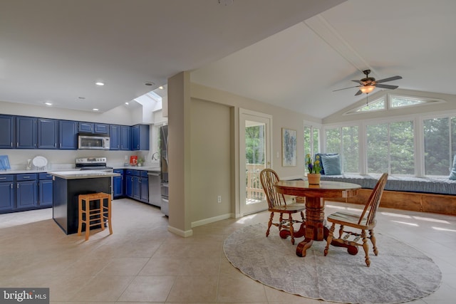 dining space with light tile patterned floors, ceiling fan, baseboards, and recessed lighting