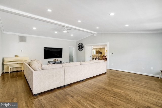 living room with crown molding, dark wood-style flooring, and baseboards