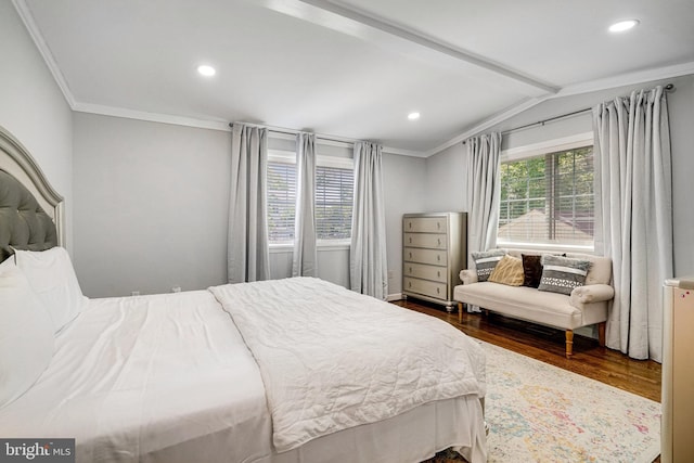 bedroom with dark wood-type flooring, ornamental molding, and recessed lighting
