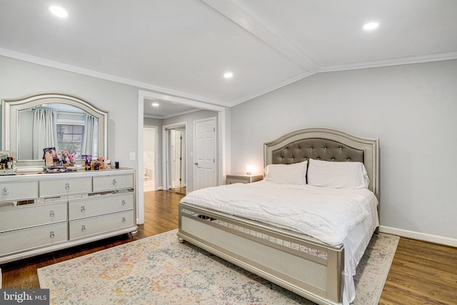 bedroom featuring crown molding, dark wood-type flooring, recessed lighting, vaulted ceiling, and baseboards