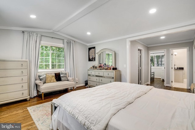 bedroom featuring wood finished floors, multiple windows, ornamental molding, recessed lighting, and baseboards