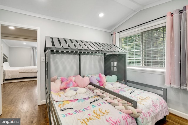 bedroom with wood finished floors, crown molding, baseboards, recessed lighting, and vaulted ceiling