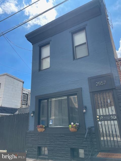 2557 Tilton St, Philadelphia, PA 19125 - view of home's exterior with stucco siding