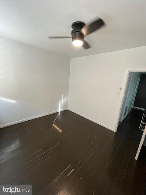 2557 Tilton St, Philadelphia, PA 19125 - spare room featuring dark wood-type flooring, baseboards, and ceiling fan