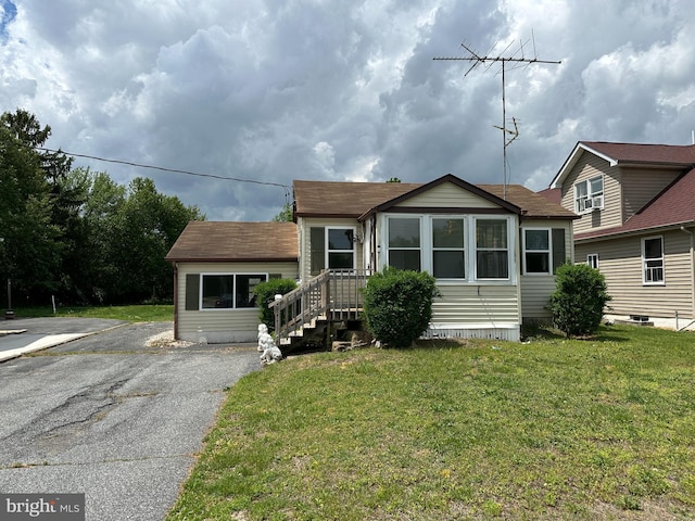 5539 Dupont Pkwy, Smyrna, DE 19977 - view of front of house with a front lawn and a shingled roof