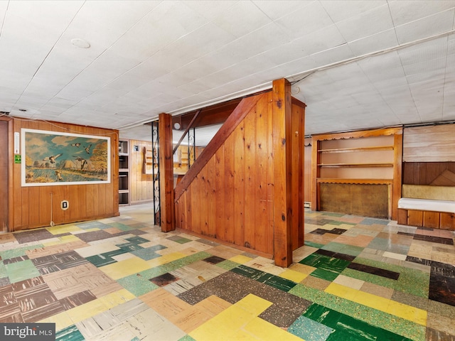 826 W 16th St, Front Royal, VA 22630 - finished below grade area with wood walls, tile patterned floors, and stairway