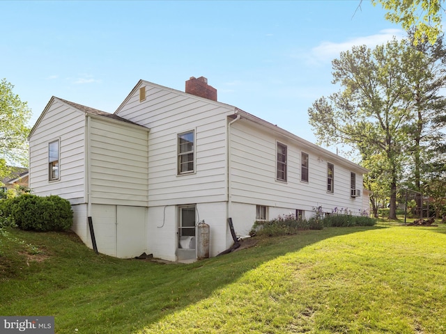826 W 16th St, Front Royal, VA 22630 - view of side of property with a chimney and a lawn