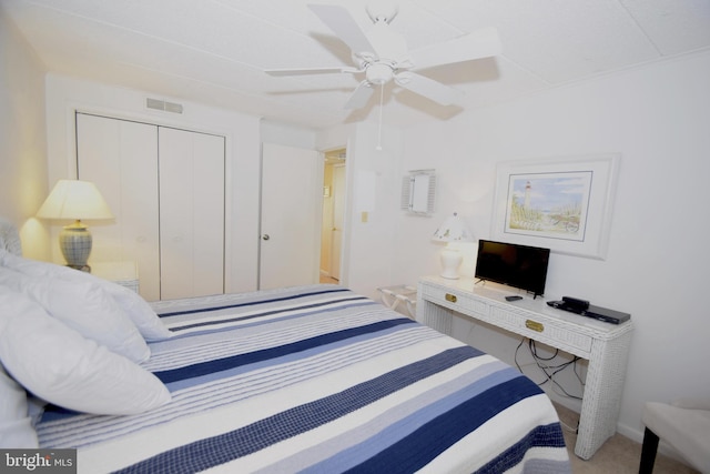 107 Convention Center Dr Unit 148D, Ocean City, MD 21842 - carpeted bedroom with a closet and a ceiling fan