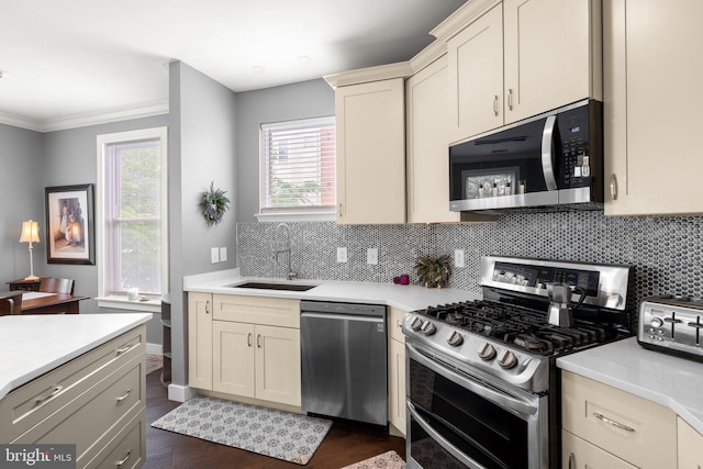9480 Virginia Center Blvd Unit 239, Vienna, VA 22181 - kitchen featuring appliances with stainless steel finishes, a sink, dark wood finished floors, light countertops, and tasteful backsplash
