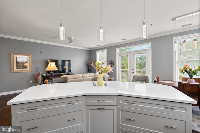 9480 Virginia Center Blvd Unit 239, Vienna, VA 22181 - kitchen with ornamental molding, dark wood finished floors, decorative light fixtures, light stone counters, and a ceiling fan