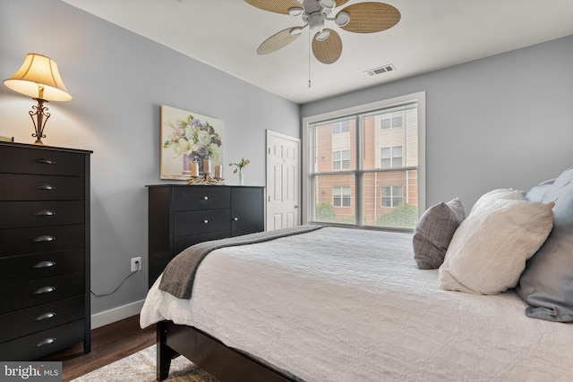 9480 Virginia Center Blvd Unit 239, Vienna, VA 22181 - bedroom featuring wood finished floors, baseboards, a closet, and ceiling fan