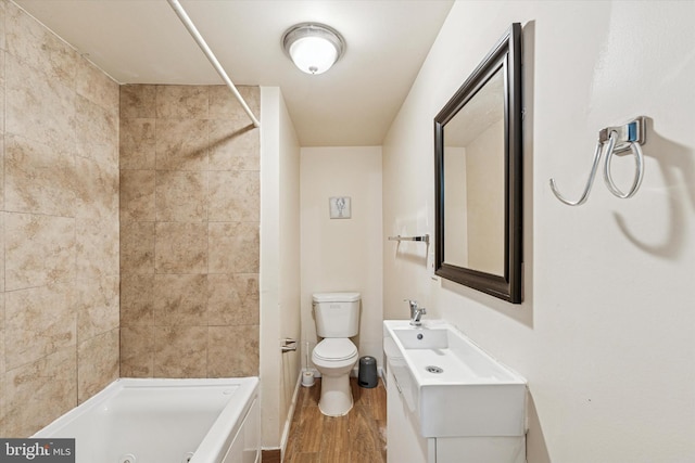 1934 Cecil B Moore Ave, Philadelphia, PA 19121 - full bath featuring wood finished floors, toilet, vanity, and baseboards