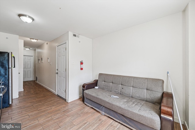 1934 Cecil B Moore Ave, Philadelphia, PA 19121 - living room featuring light wood finished floors and baseboards