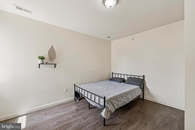 1934 Cecil B Moore Ave, Philadelphia, PA 19121 - bedroom featuring wood finished floors and baseboards