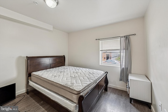 1934 Cecil B Moore Ave, Philadelphia, PA 19121 - bedroom with wood finished floors, baseboards, and radiator