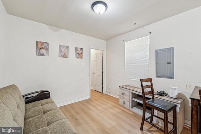 1934 Cecil B Moore Ave, Philadelphia, PA 19121 - living area featuring electric panel, light wood-style flooring, and baseboards