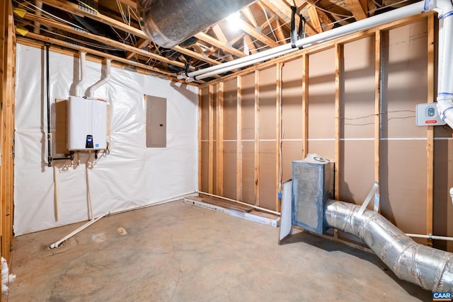 unfinished below grade area with tankless water heater and electric panel