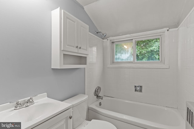 9 Queens Bridge Rd, Levittown, PA 19057 - bathroom featuring toilet, lofted ceiling, washtub / shower combination, and vanity